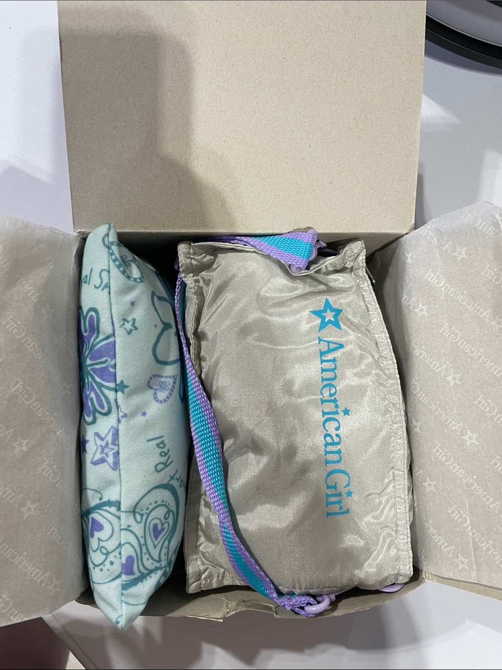 American Girl Silver Crossbody with Turquoise Logo and Purple-Turquoise Strap